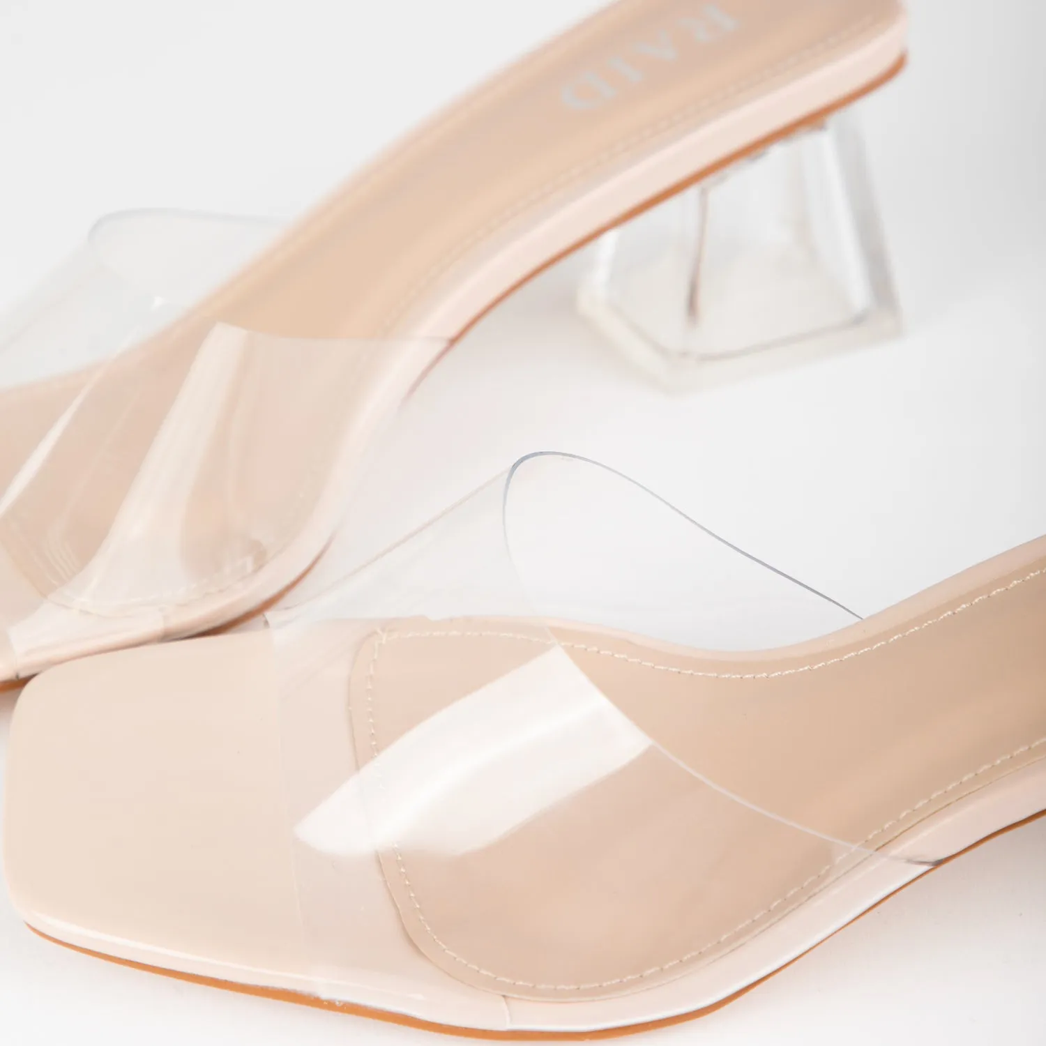 RAID Elvira Perspex Block Heeled Mules in Nude