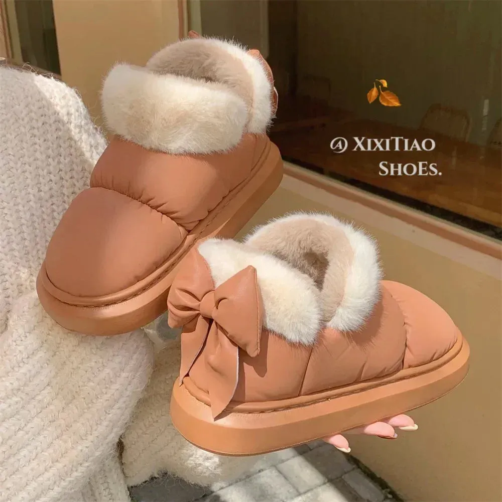 Women's Waterproof Snow Boots – Warm Thick Ankle Boots with Furry Bow, Anti-Slip Comfort for Outdoor Wear